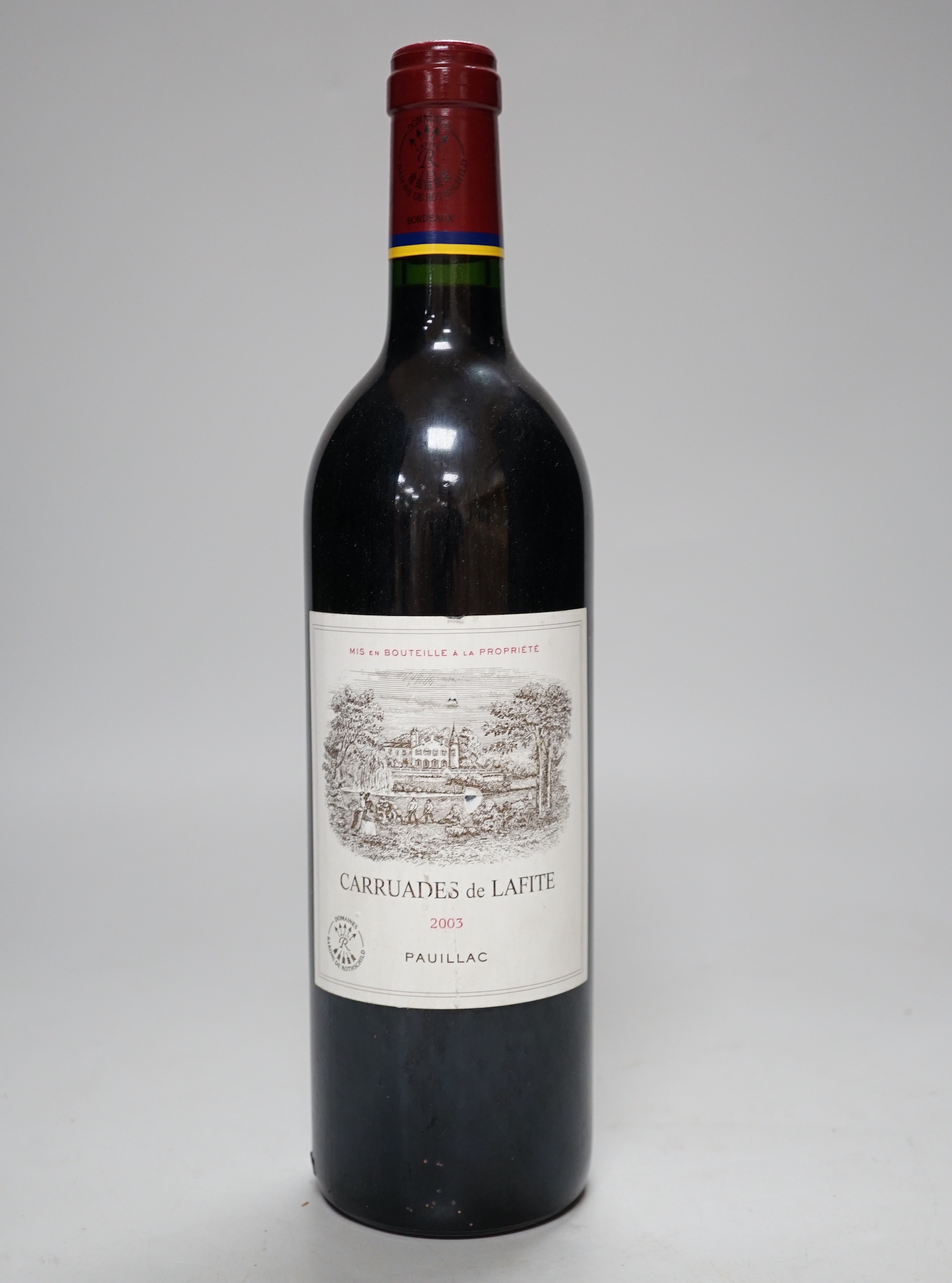 A bottle Carruades de Lafite 2003